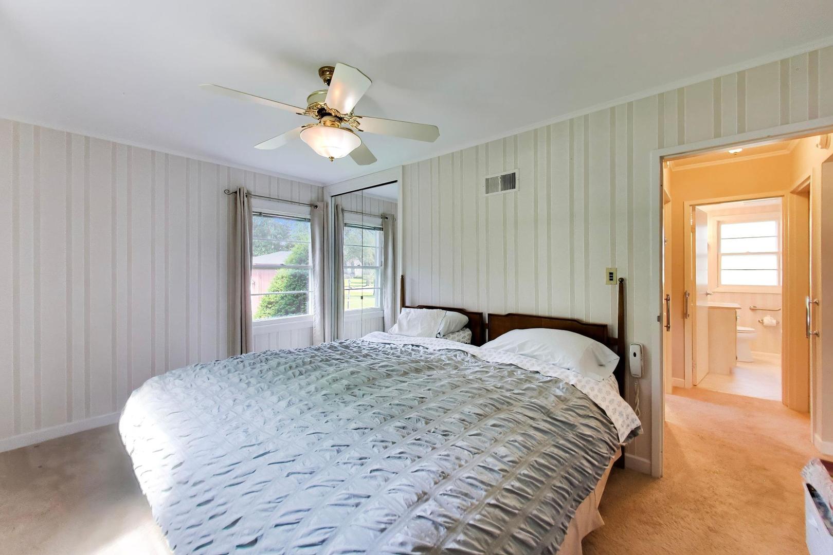 103 Cottonwood Road Northbrook, IL 60062 - Photo 21 of 50 a bedroom with a large bed and a window