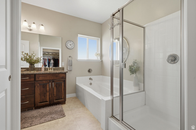1997 East 600 South Springville, UT 84663 - Photo 26 of 54 Built-in bathtub and shower with glass enclosure, wood-finish vanity with countertop, and recessed lighting