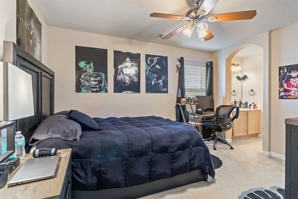 2228 Condor Street Grand Prairie, TX 75052 - Photo 30 of 33 a living room with furniture and a window