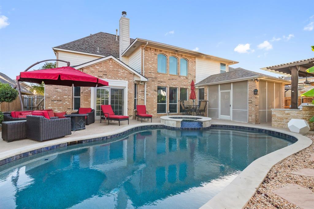 2228 Condor Street Grand Prairie, TX 75052 - Photo 3 of 33 a view of a house with pool and chairs