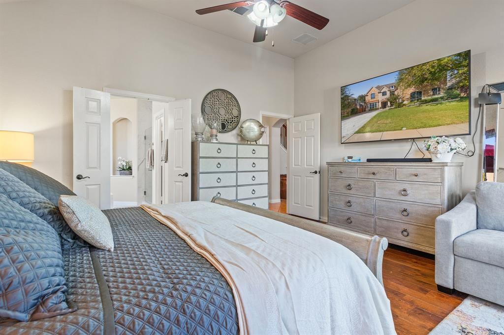 2228 Condor Street Grand Prairie, TX 75052 - Photo 5 of 33 a bedroom with a bed and dresser