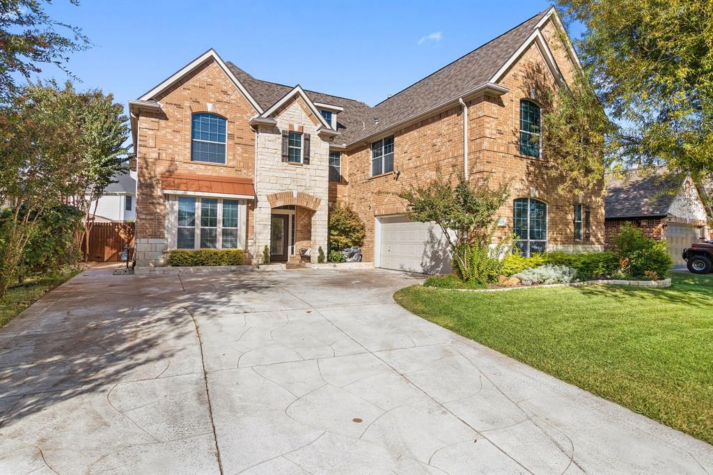 2228 Condor Street Grand Prairie, TX 75052 - Photo 7 of 33 a front view of a house with a yard