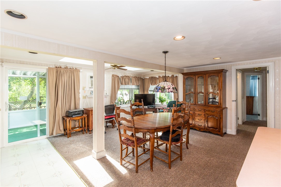 1292 West Shore Road Warwick, RI 02889 - Photo 7 of 29 Dining area with slider to porch