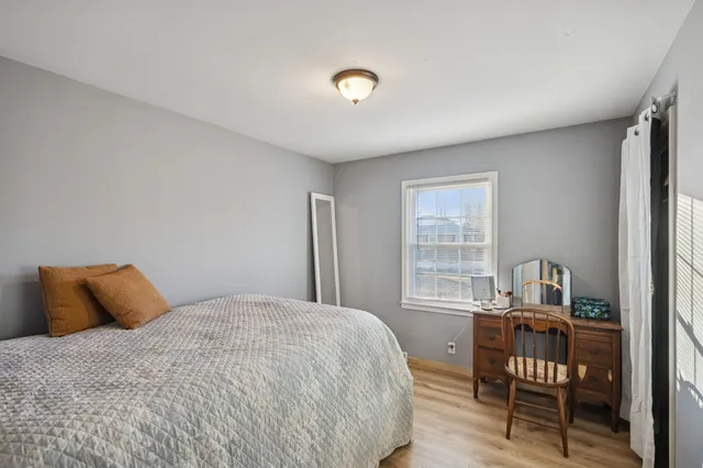 a workspace with furniture and wooden floor