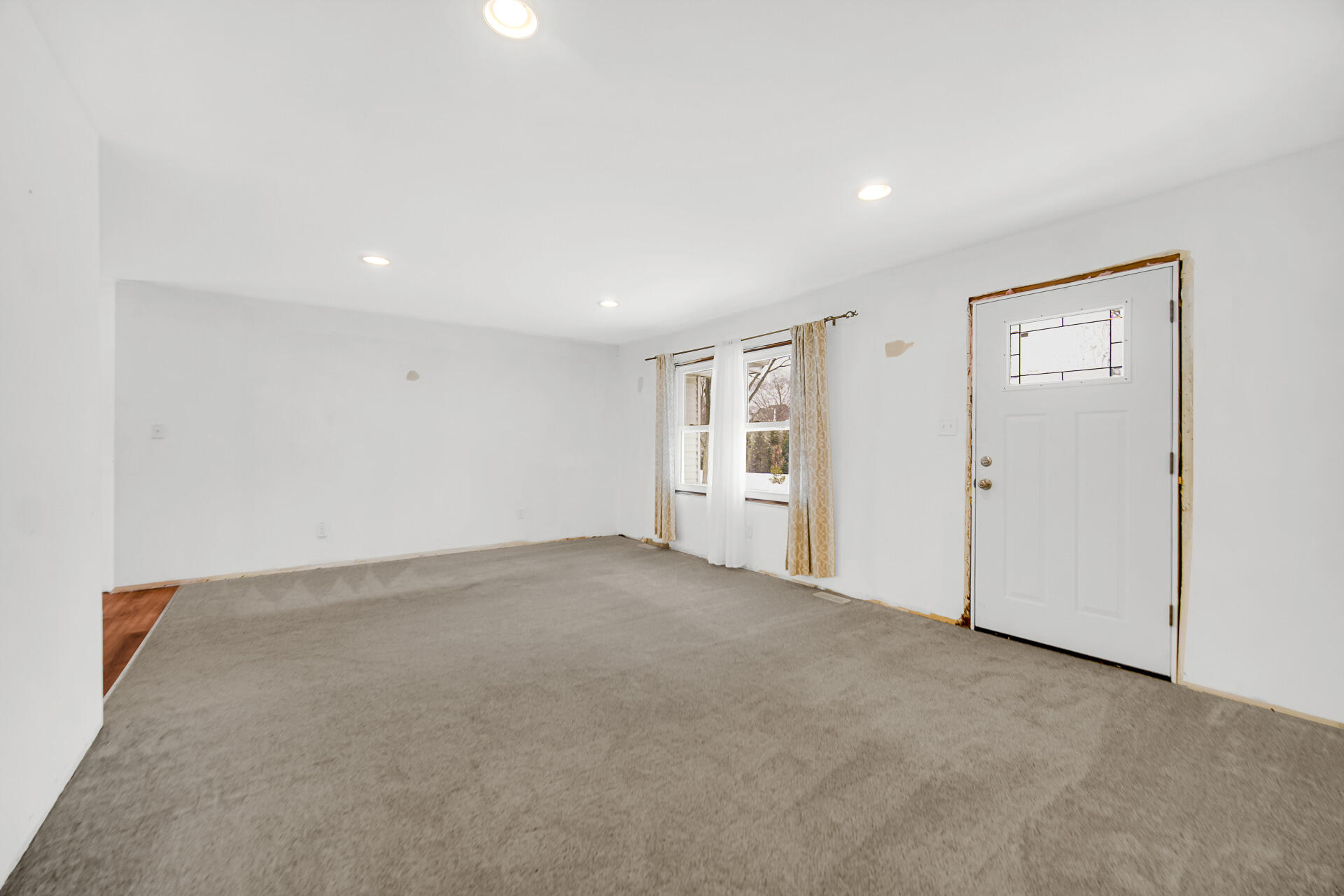7210 East 97th Avenue Crown Point, IN 46307 - Photo 12 of 25 a view of an empty room with closet and a window