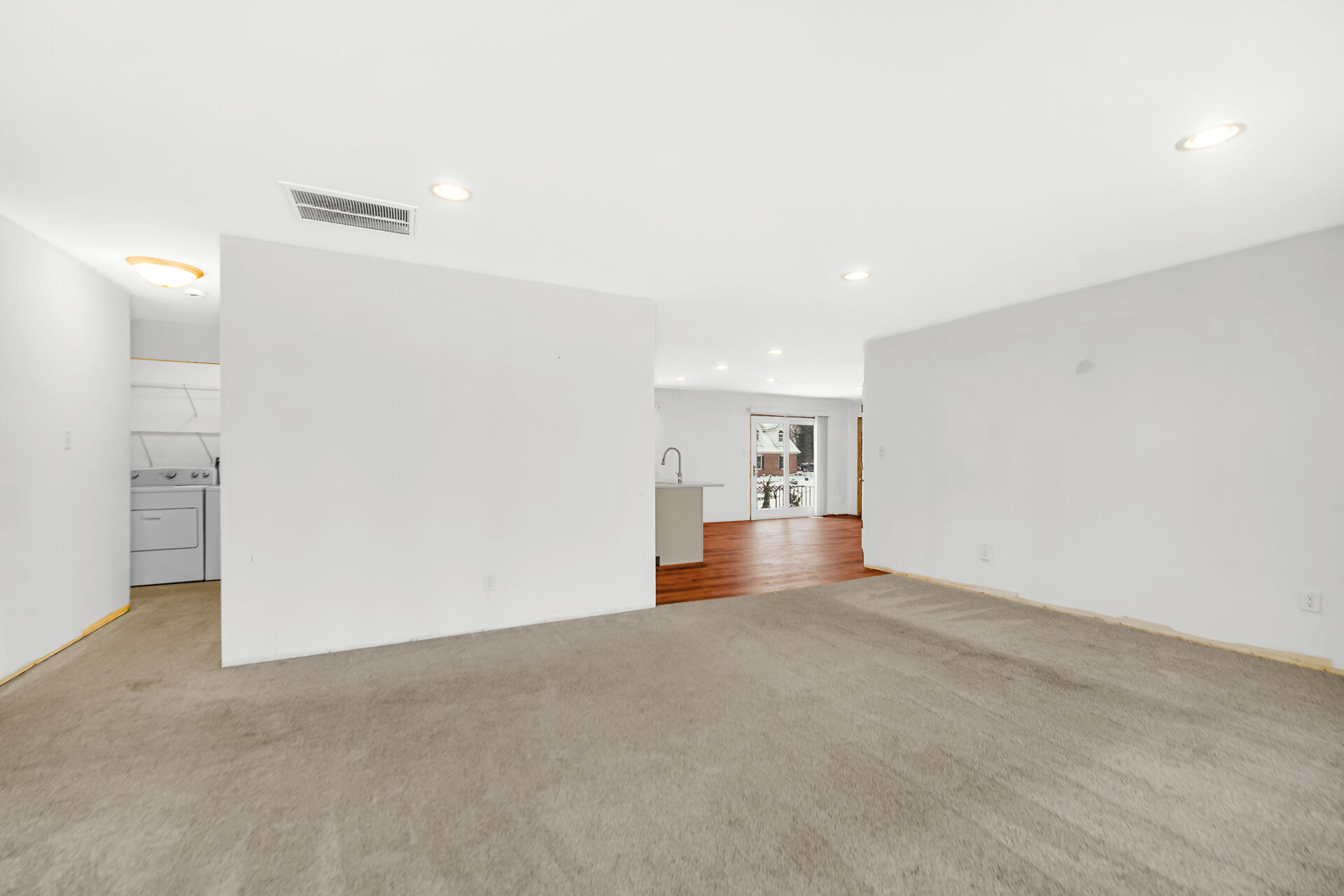 7210 East 97th Avenue Crown Point, IN 46307 - Photo 13 of 25 a view of empty room with wooden floor