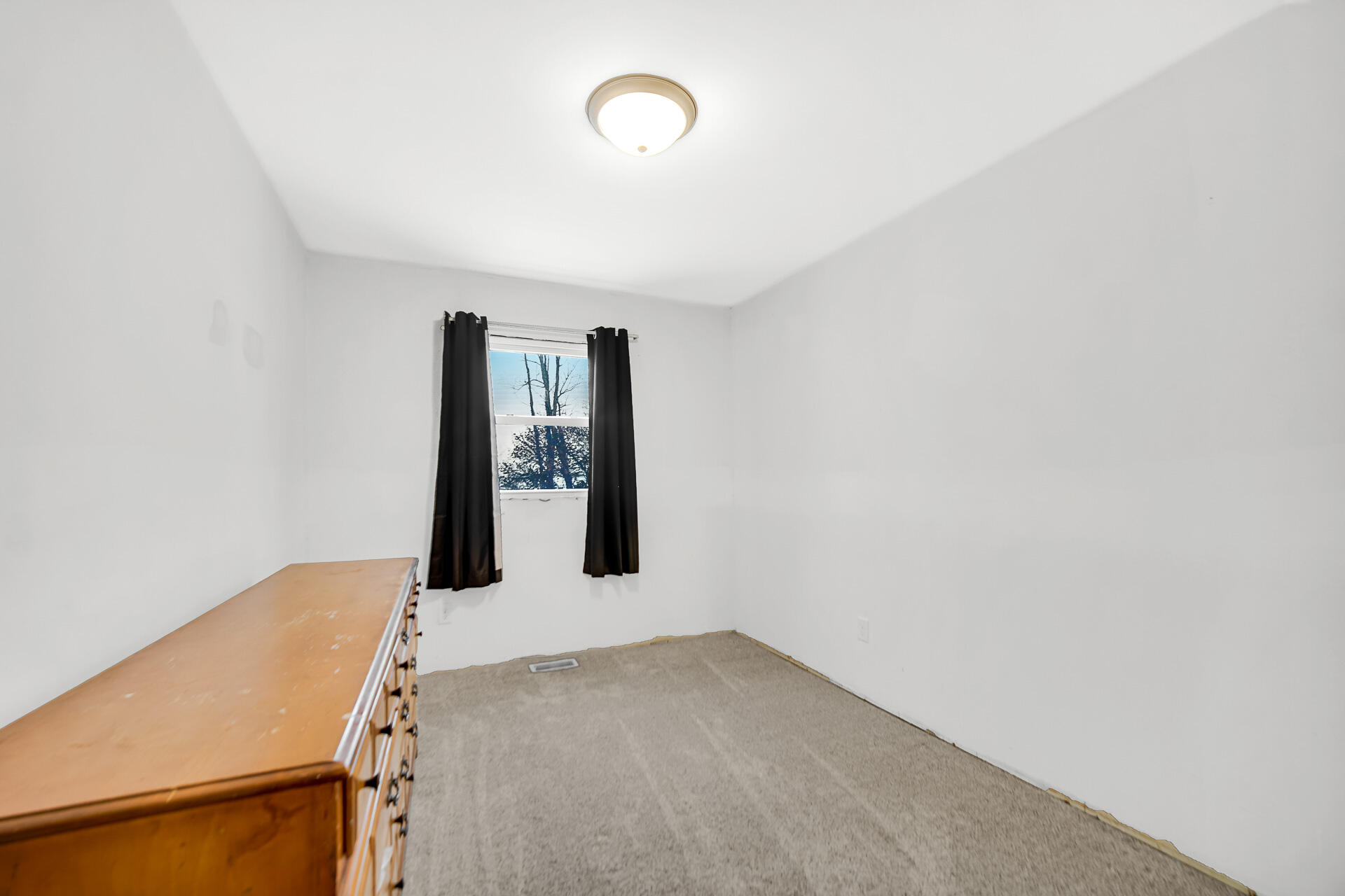 7210 East 97th Avenue Crown Point, IN 46307 - Photo 16 of 25 a view of a room with window and stairs