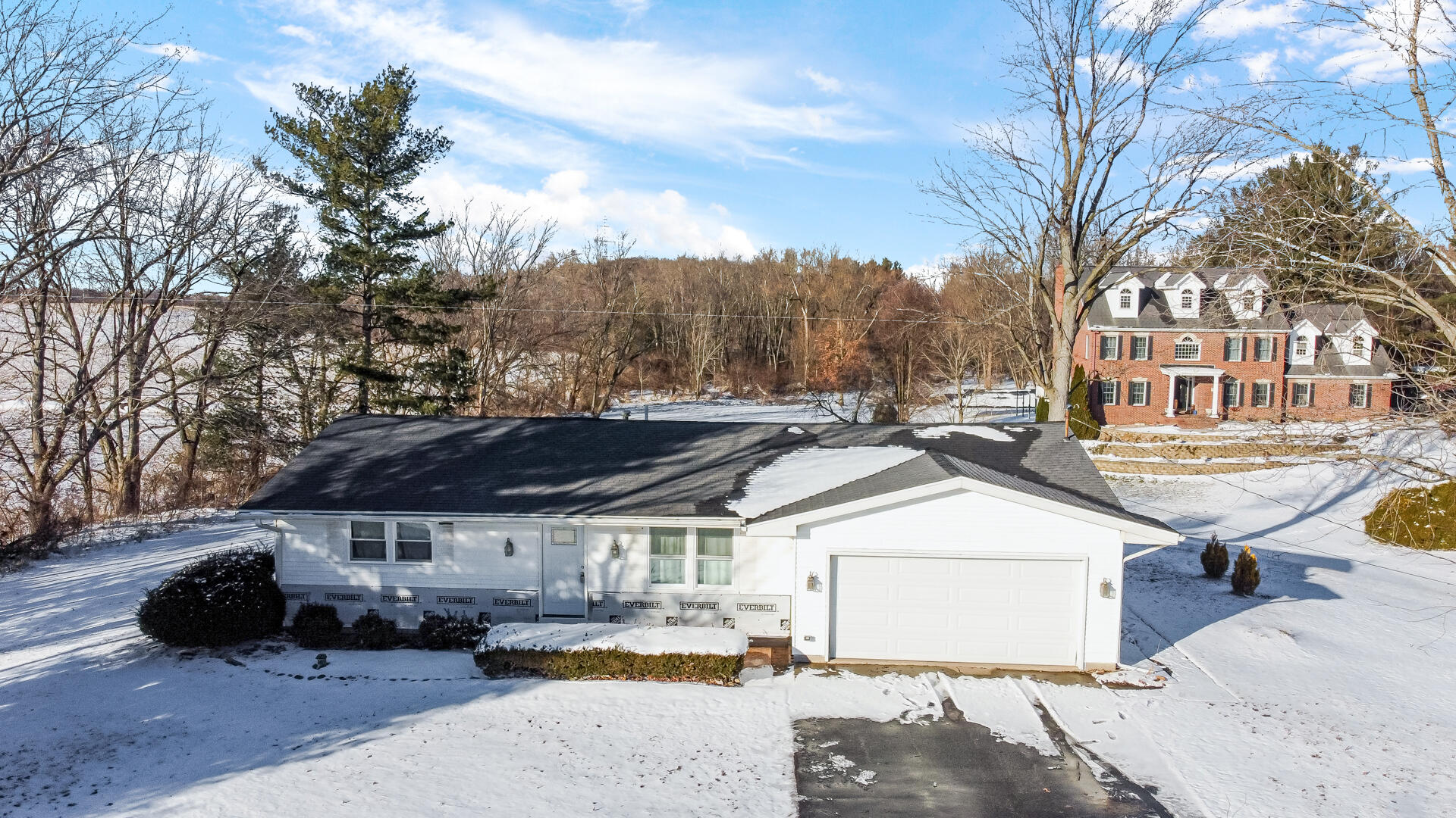 7210 East 97th Avenue Crown Point, IN 46307 - Photo 21 of 25 a view of multiple houses with cars parked