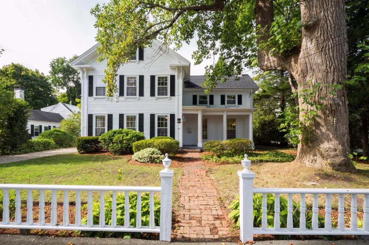 490 Main Street Centerville, MA 02632 - Photo 1 of 35 a front view of a house with a yard