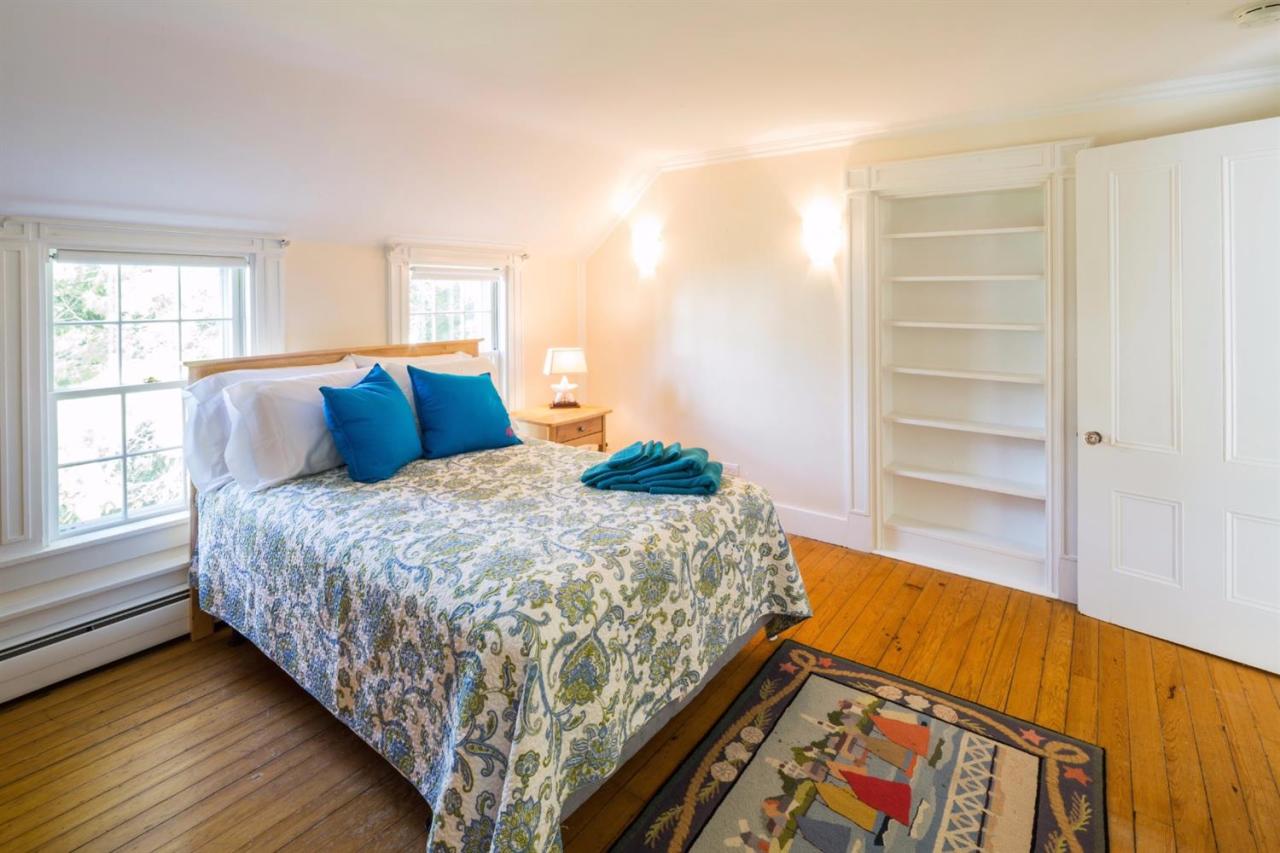 490 Main Street Centerville, MA 02632 - Photo 27 of 35 a bedroom with a bed and a window