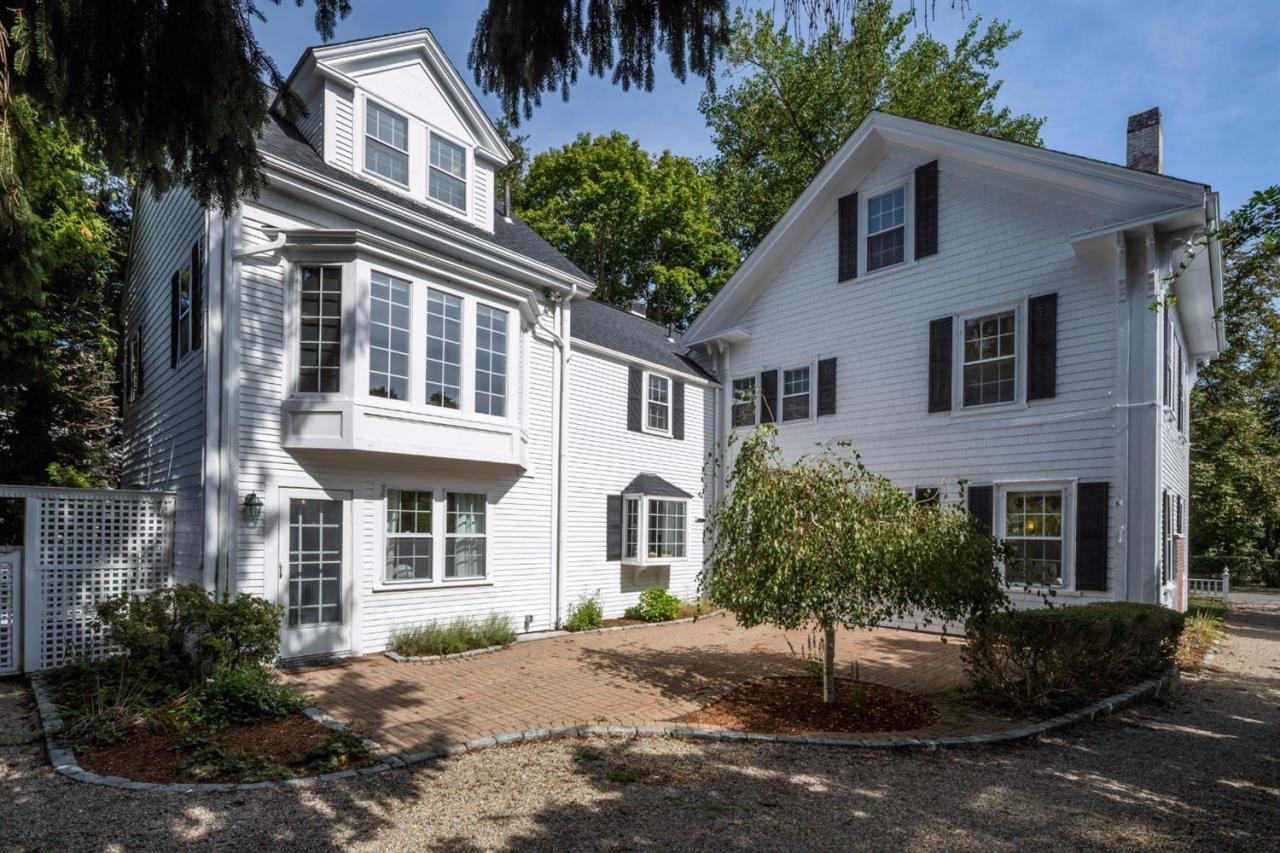 490 Main Street Centerville, MA 02632 - Photo 30 of 35 a front view of a house with a garden