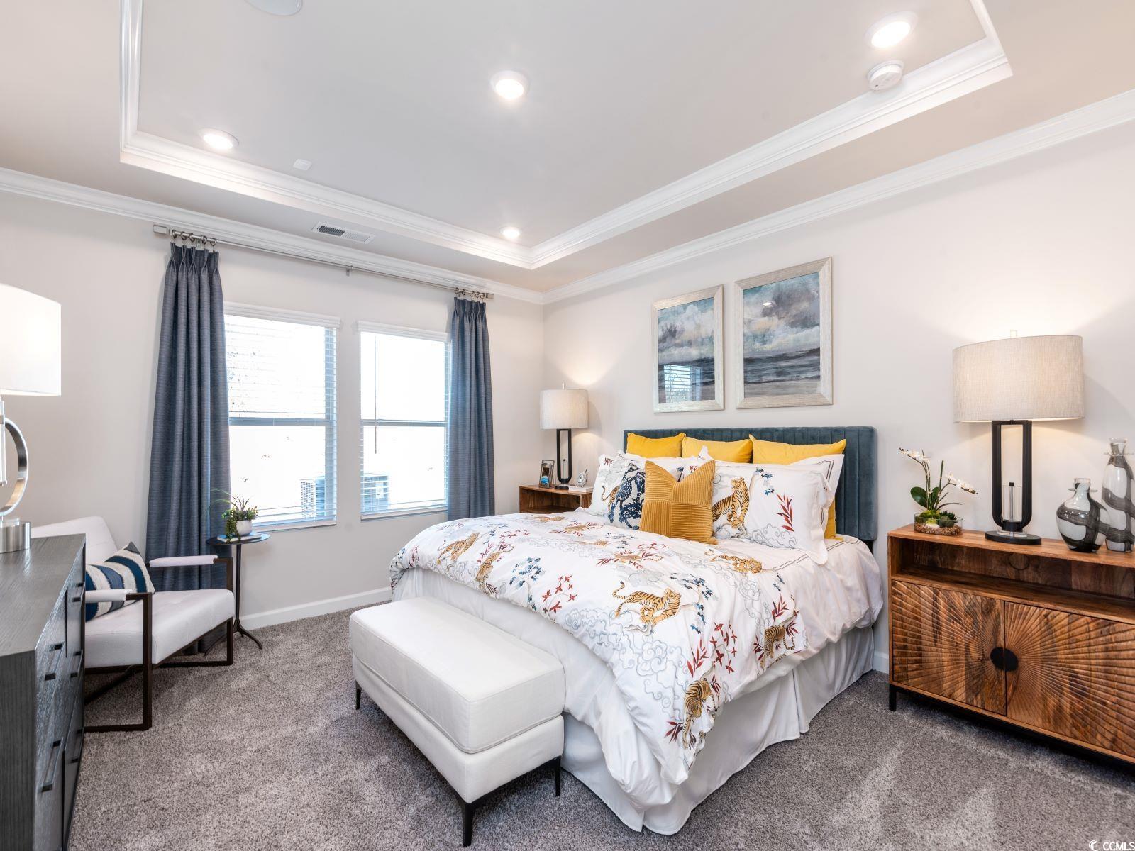 112 Red Cedar Court Longs, SC 29568 - Photo 8 of 13 Carpeted bedroom featuring a tray ceiling, ornamental molding, and recessed lighting