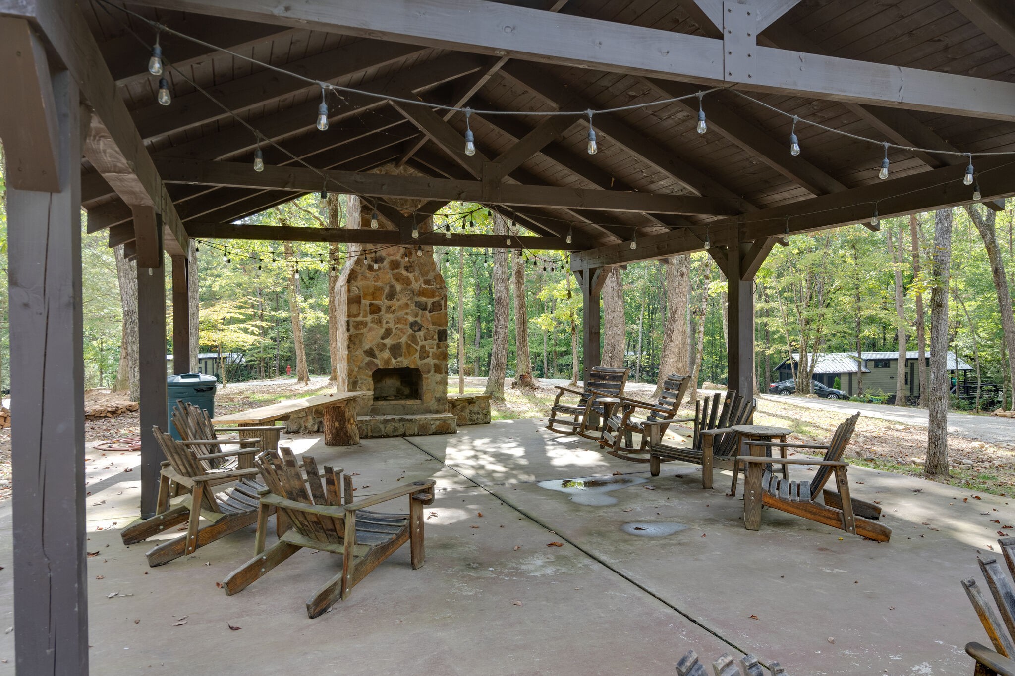 0 Woodly Branch Road Tracy City, TN 37387 - Photo 18 of 28 a view of a patio with table and chairs and potted plants