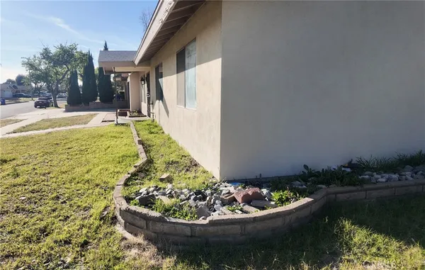 a view of a swimming pool with a back yard