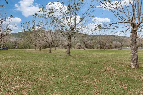 a view of outdoor space with green field