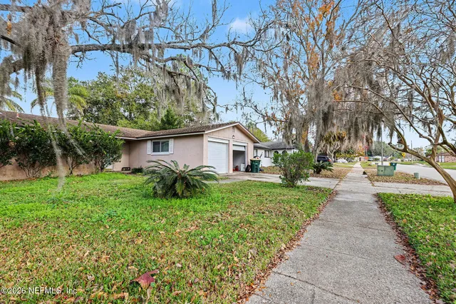 a backyard of a house with seating space