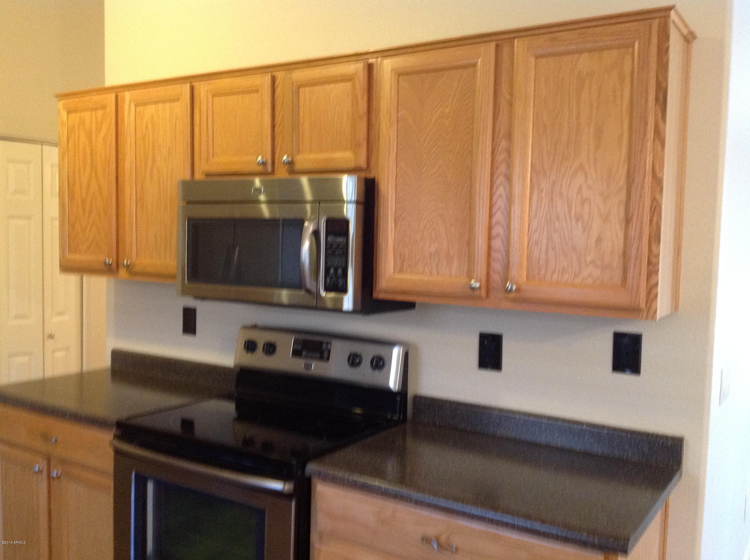 4717 East Mossman Road Phoenix, AZ 85050 - Photo 7 of 12 CUSTOM CABINETS WITH SS HANDLES