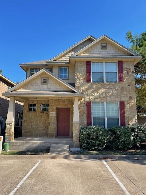 2513 South 2nd Street, Unit 3 Waco, TX 76706 - Photo 1 of 35 a front view of a house with a garden