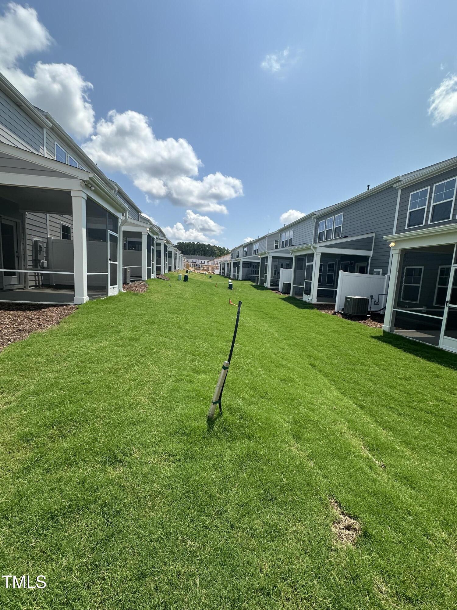 1726 Barrett Run Trail Apex, NC 27502 - Photo 11 of 50 a view of a house with a yard and sitting area