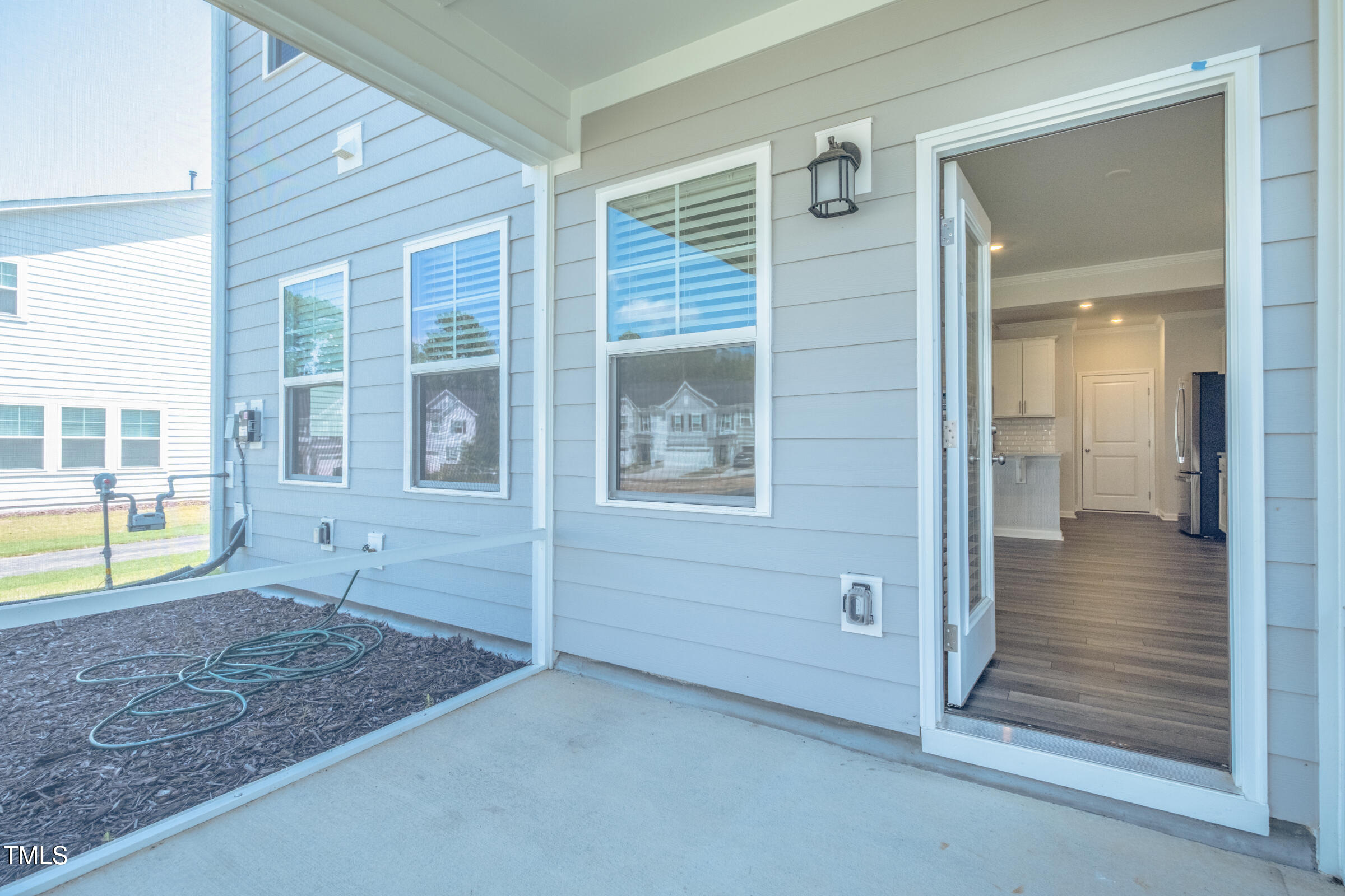 1726 Barrett Run Trail Apex, NC 27502 - Photo 26 of 50 an empty room with entrance and windows