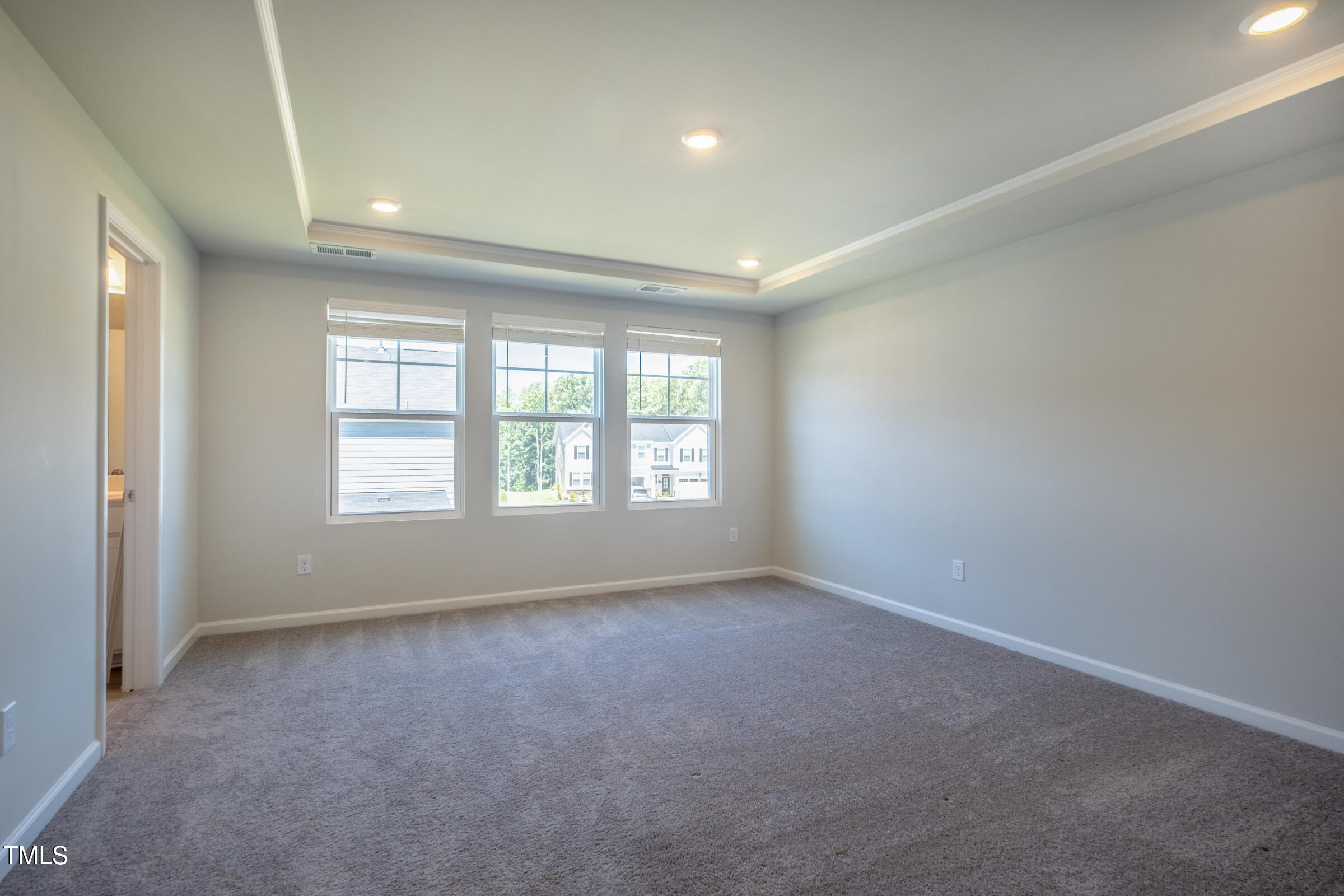1726 Barrett Run Trail Apex, NC 27502 - Photo 30 of 50 an empty room with windows