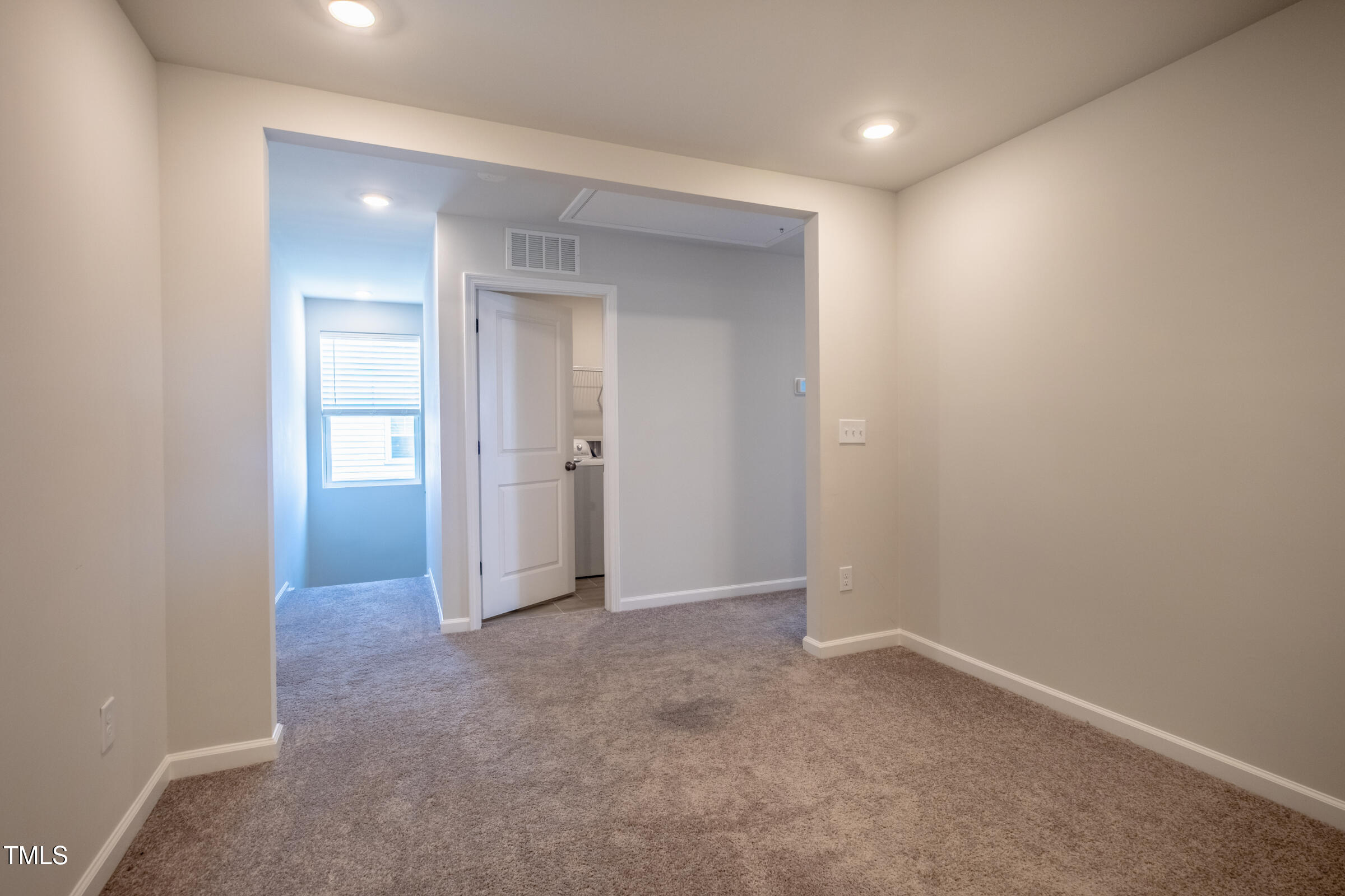 1726 Barrett Run Trail Apex, NC 27502 - Photo 35 of 50 an empty room with closet and a bathroom