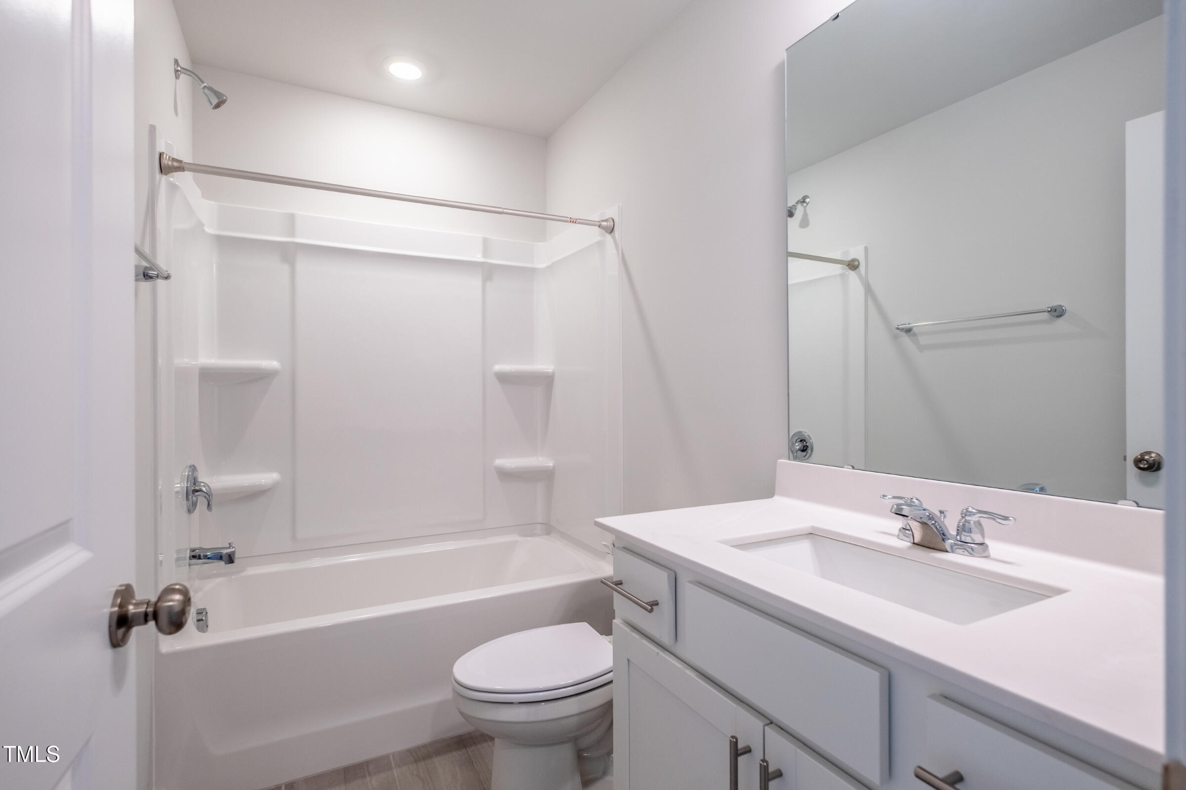 1726 Barrett Run Trail Apex, NC 27502 - Photo 39 of 50 a bathroom with a sink toilet tub and shower