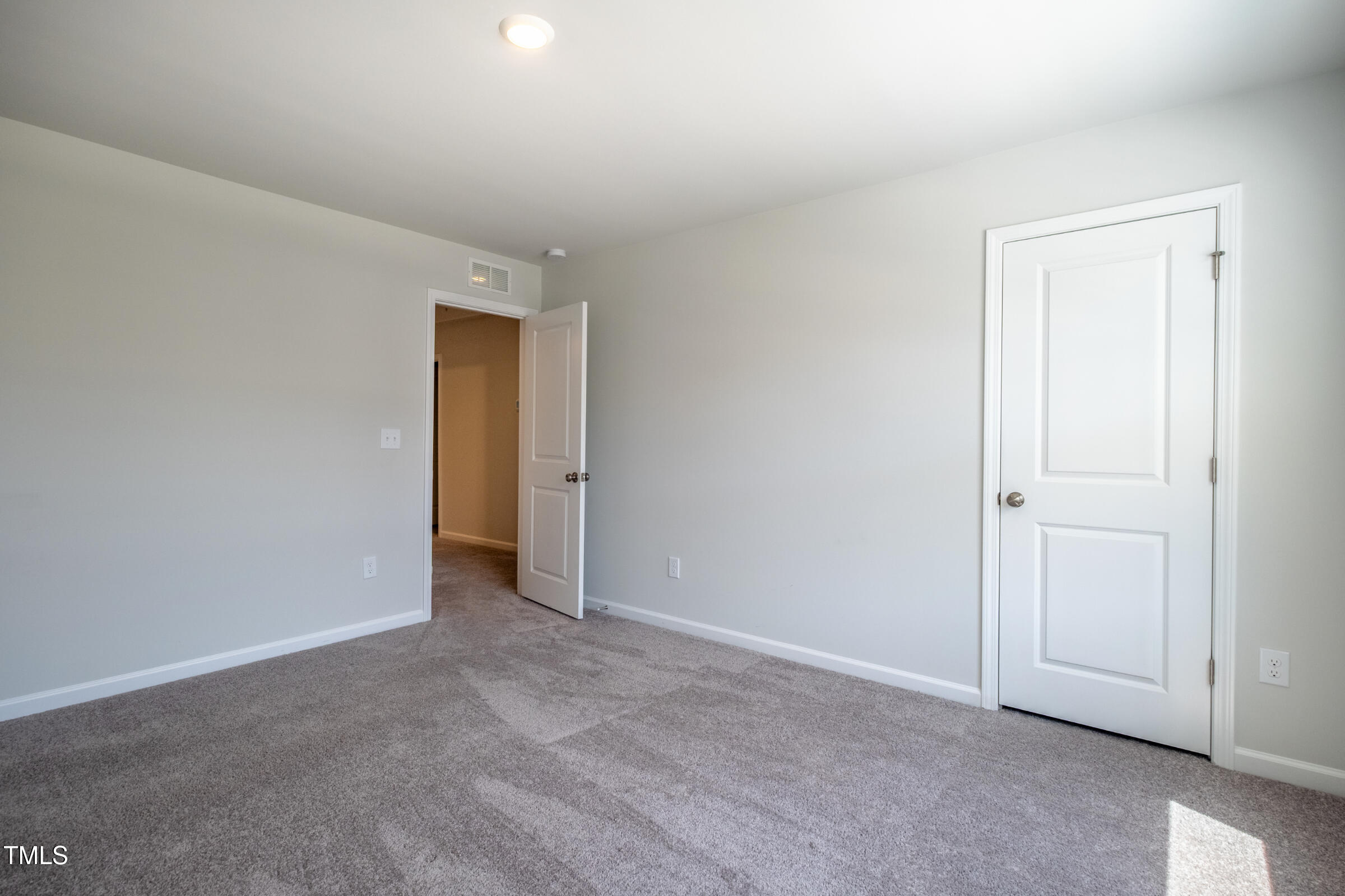 1726 Barrett Run Trail Apex, NC 27502 - Photo 41 of 50 a view of an empty room with closet area