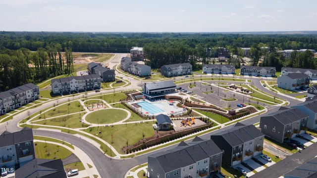 a view of swimming pool with outdoor seating