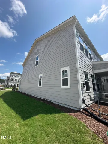 a house view with a garden space