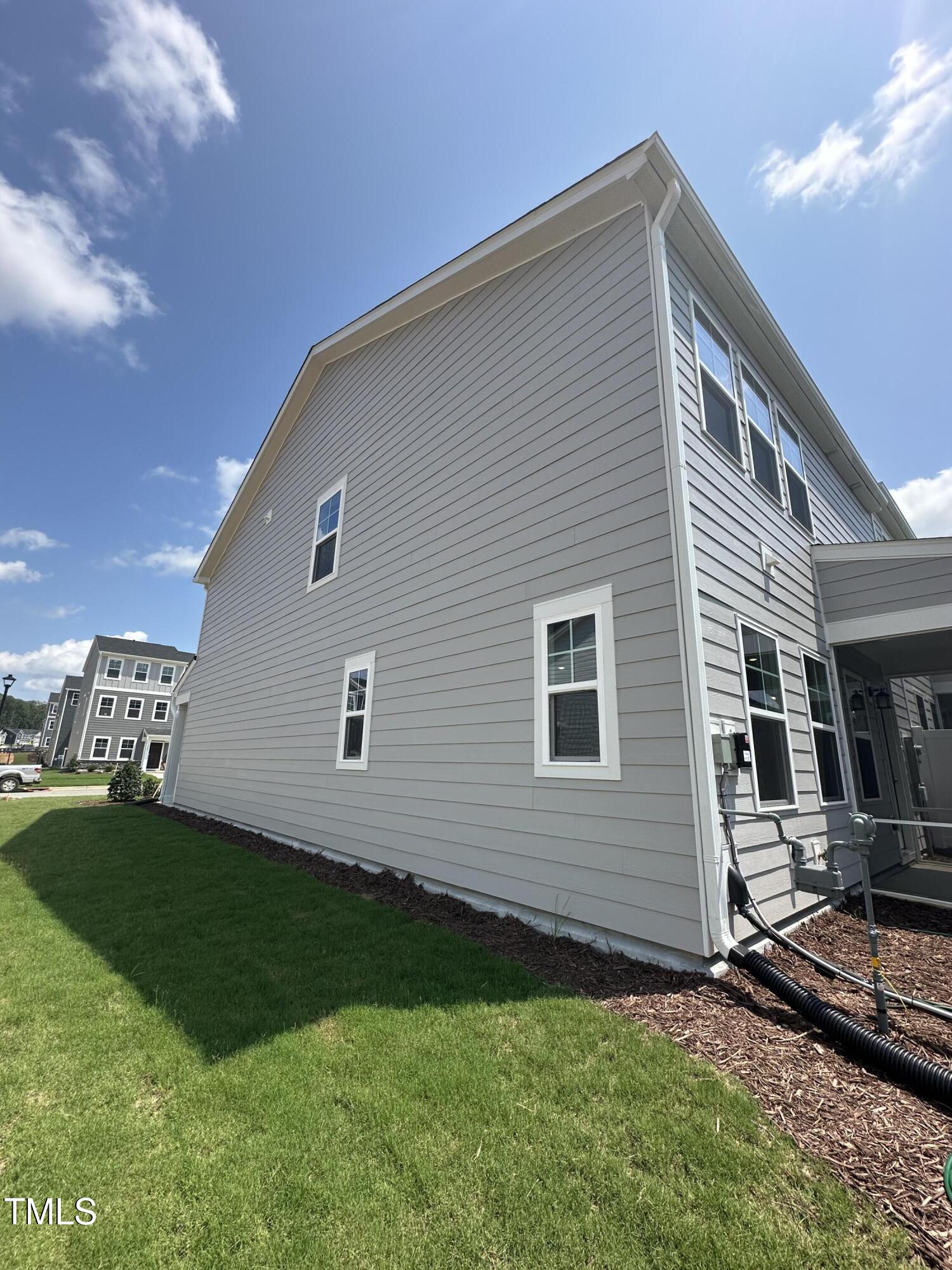 1726 Barrett Run Trail Apex, NC 27502 - Photo 8 of 50 a house view with a garden space