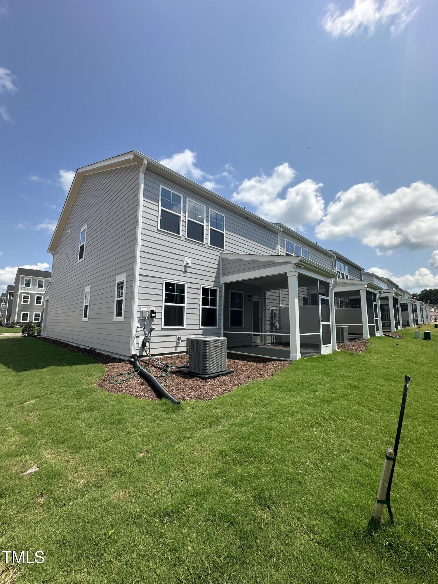 1726 Barrett Run Trail Apex, NC 27502 - Photo 10 of 50 a backyard of a house with table and chairs