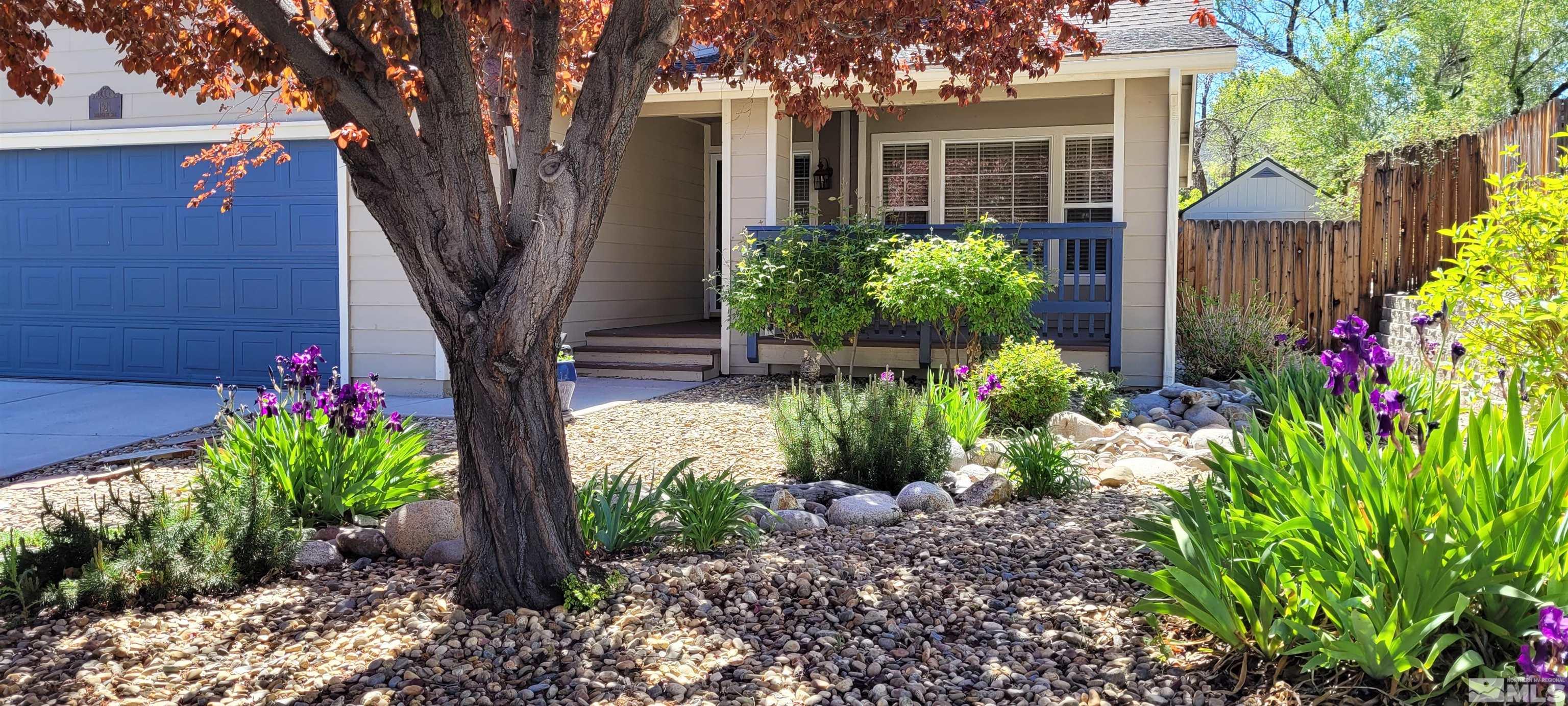 1921 Stargaze Way Reno, NV 89523 - Photo 3 of 26 a front view of a house with a yard