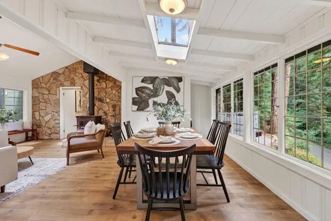 a kitchen with stainless steel appliances granite countertop a stove and a refrigerator