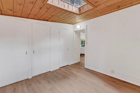 a bathroom with a toilet sink and shower