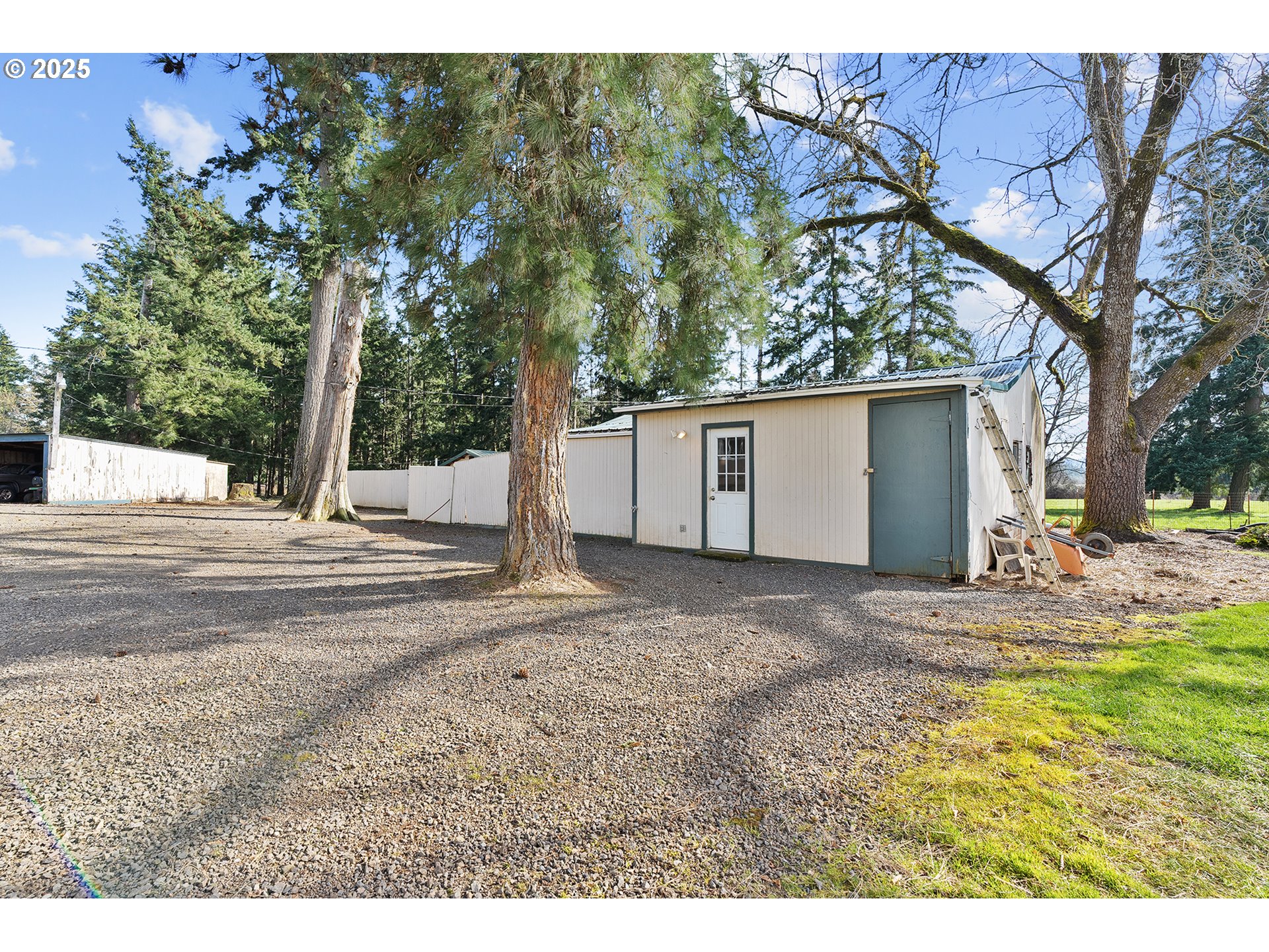 12950 South New Era Road Oregon City, OR 97045 - Photo 32 of 45 a view of a backyard with large trees