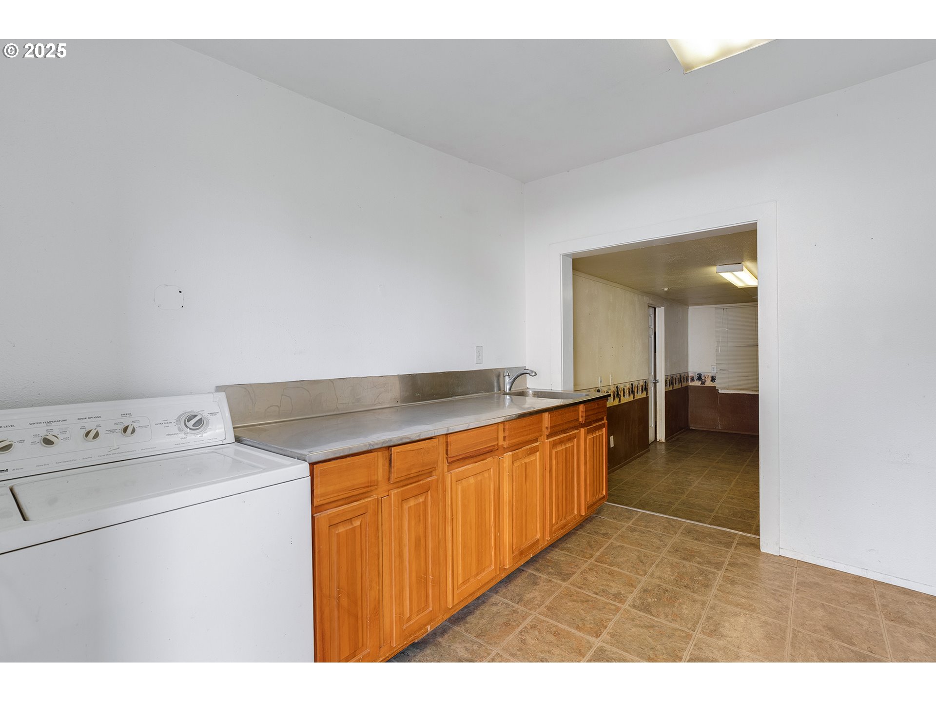 12950 South New Era Road Oregon City, OR 97045 - Photo 34 of 45 a kitchen with granite countertop a stove and a sink