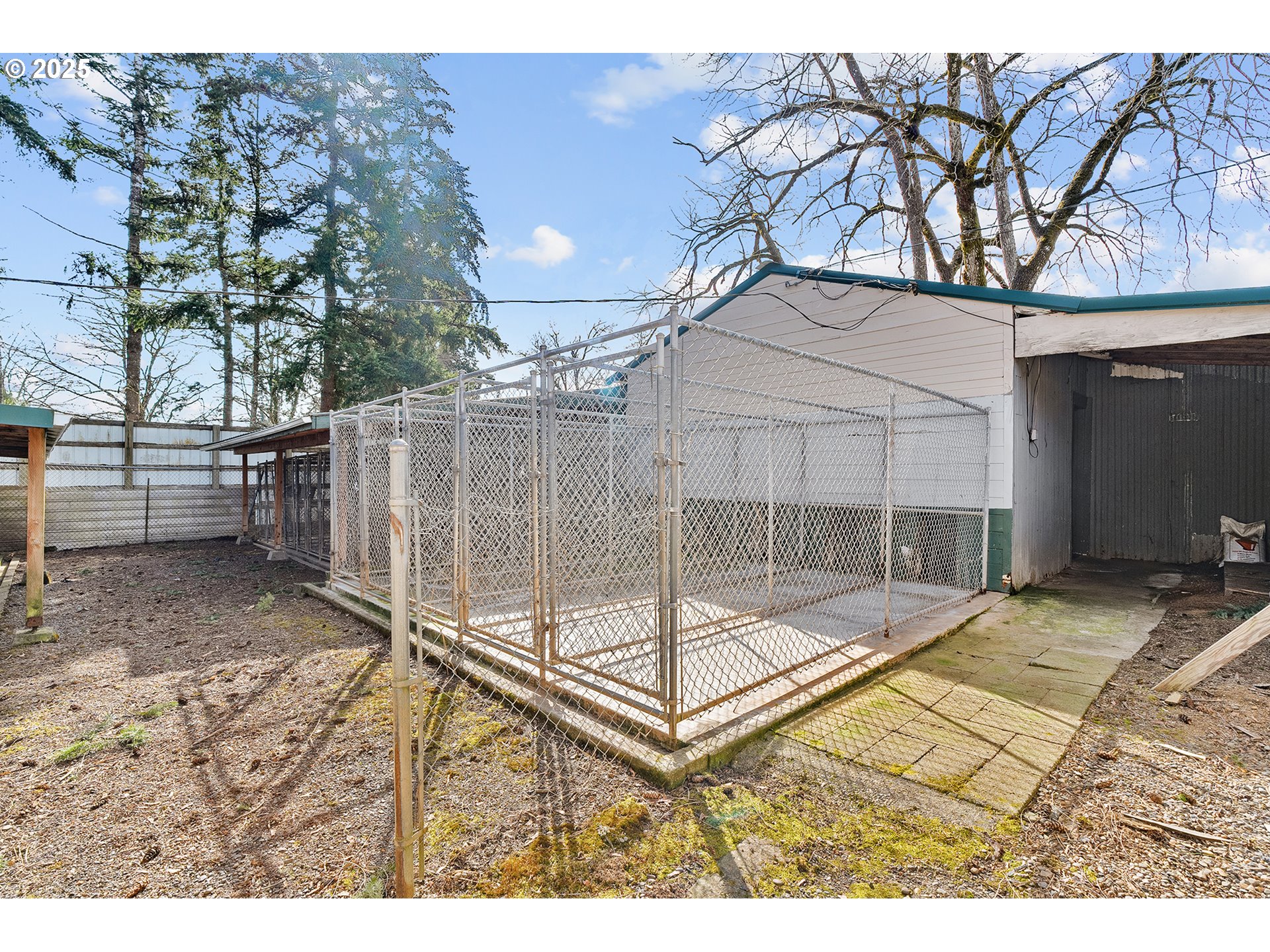 12950 South New Era Road Oregon City, OR 97045 - Photo 35 of 45 a backyard of a house with basket ball table and chairs