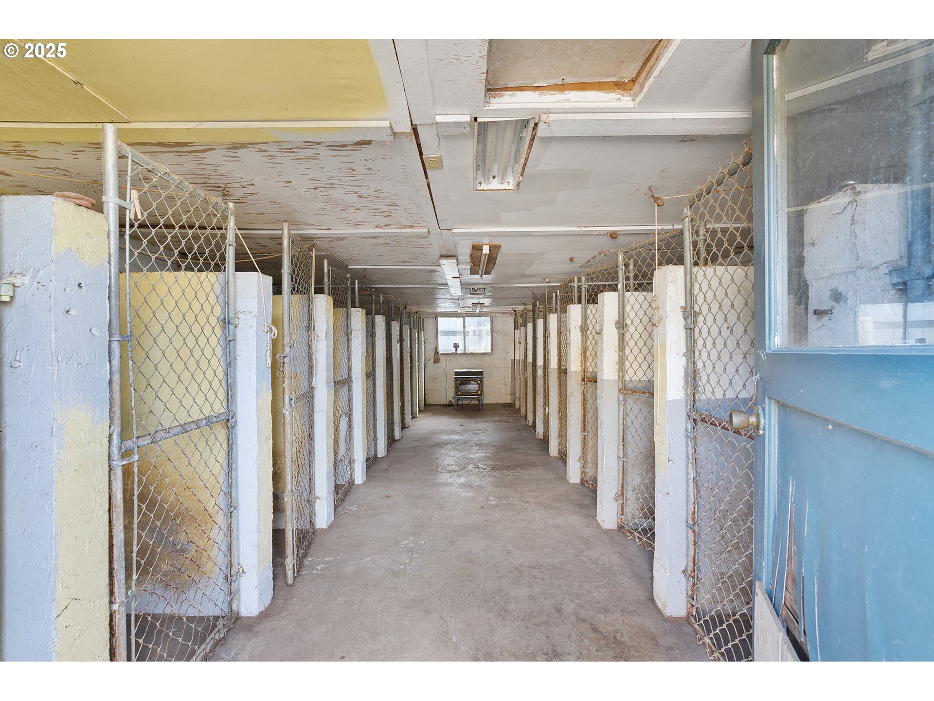12950 South New Era Road Oregon City, OR 97045 - Photo 40 of 45 a view of a pathway of a building with wooden walls