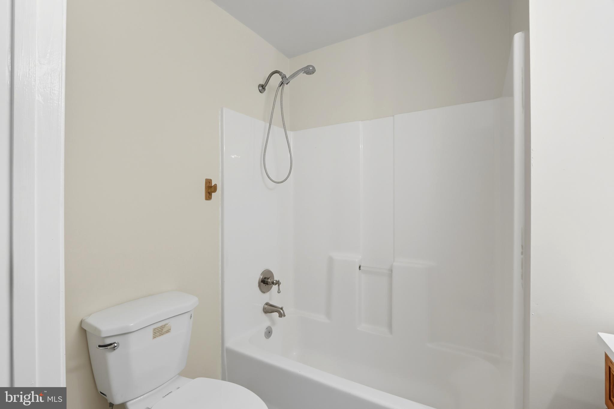 1314 James Street Baltimore, MD 21223 - Photo 15 of 19 a bathroom with a shower and a toilet