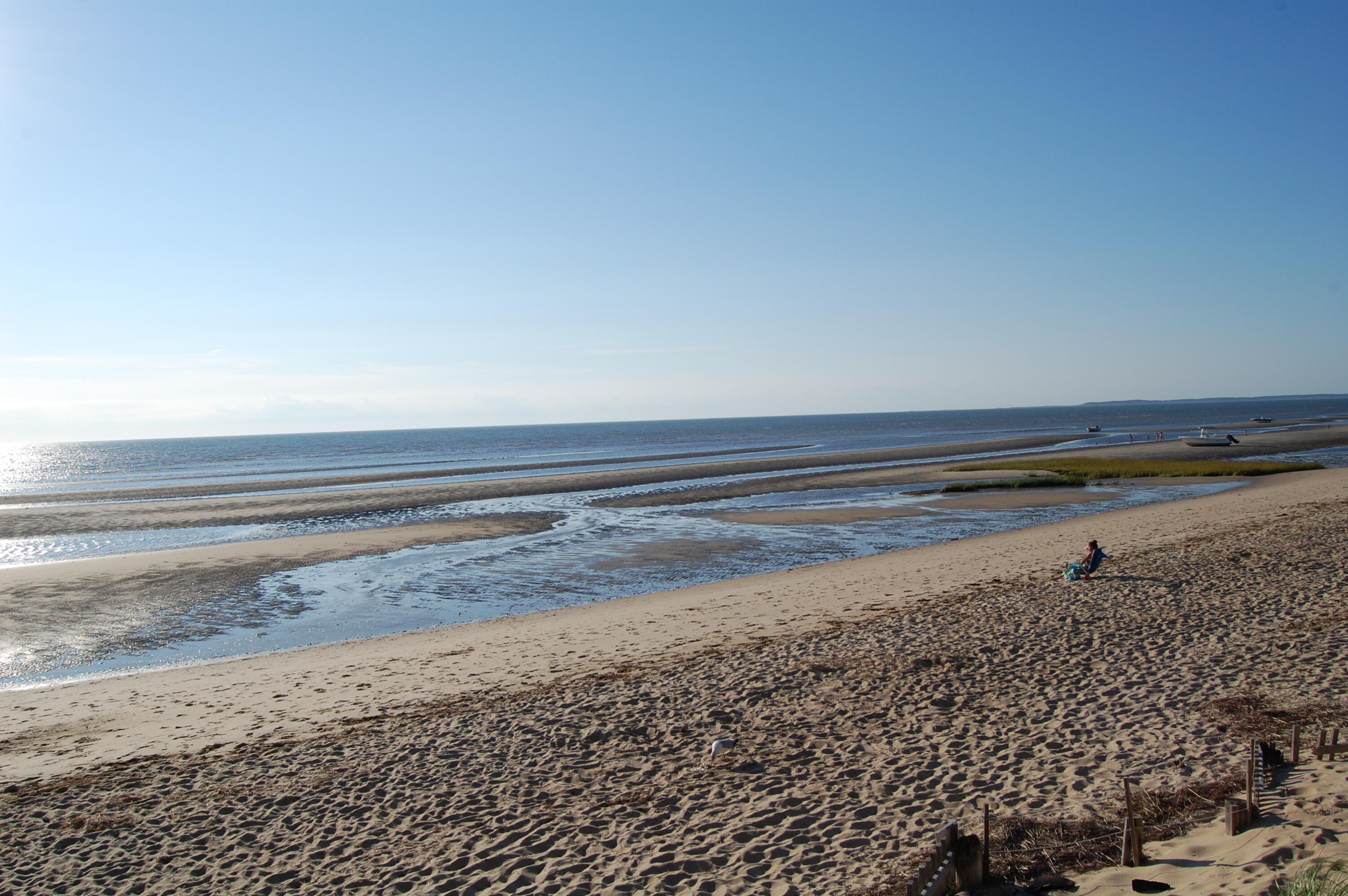 45 Swift Road Eastham, MA 02642 - Photo 10 of 24 a view of a refrigerator with wooden floor