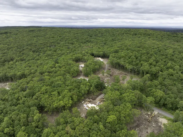 a view of a lake with a yard