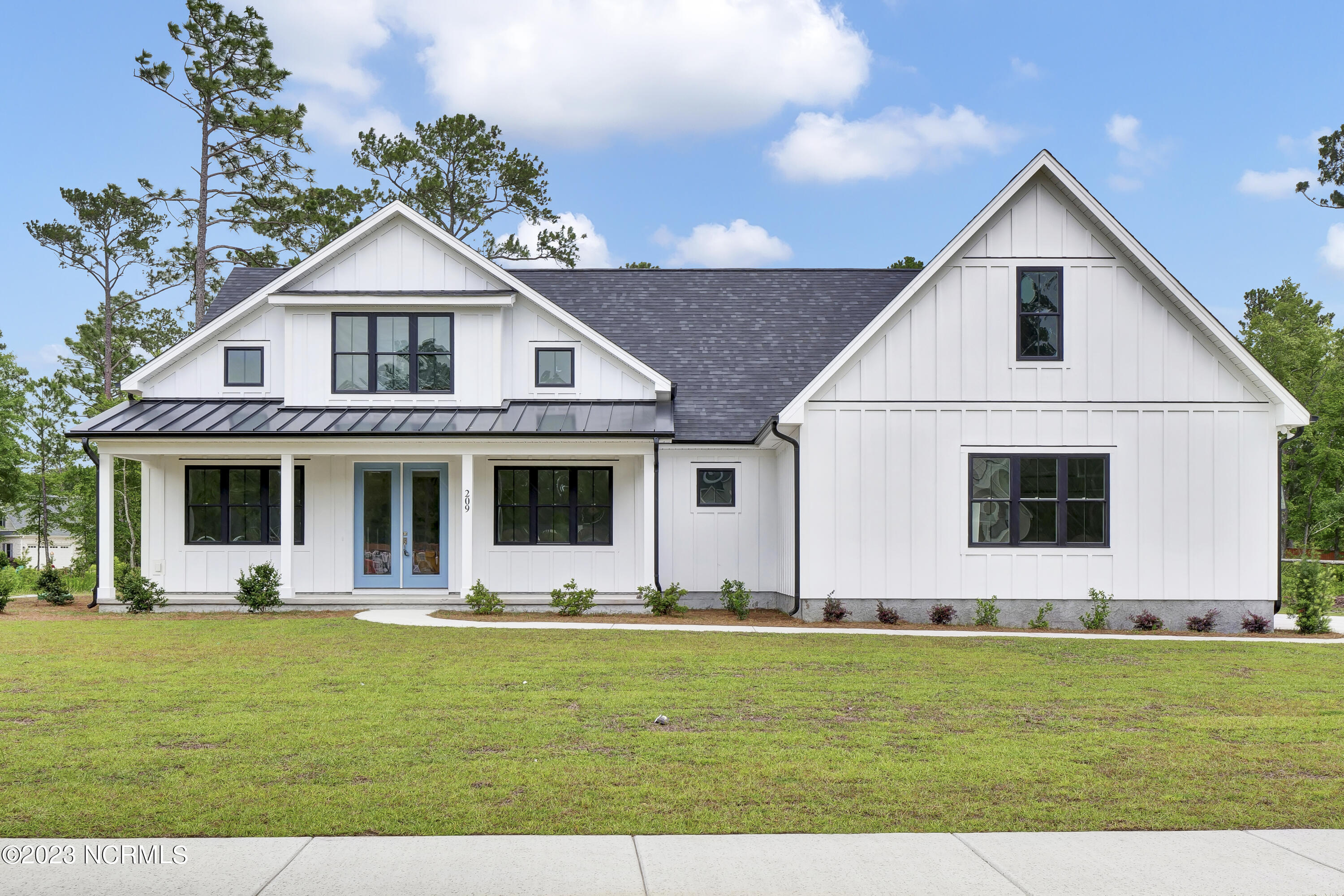 209 Hampton Court Hampstead, NC 28443 - Photo 1 of 32 P9955548