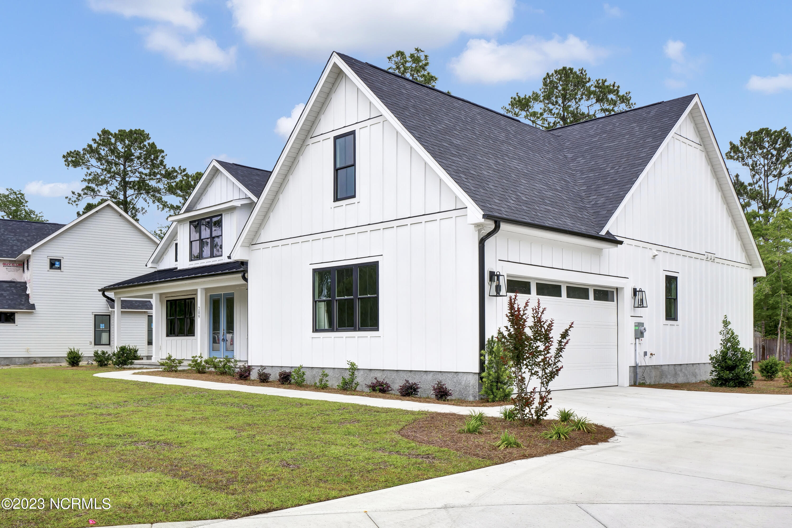 209 Hampton Court Hampstead, NC 28443 - Photo 2 of 32 P9955543