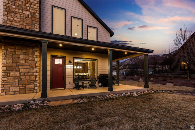 1210 East Bristle Cone Road Pine Valley, UT 84781 - Photo 41 of 54 Doorway to property with stone siding and a porch