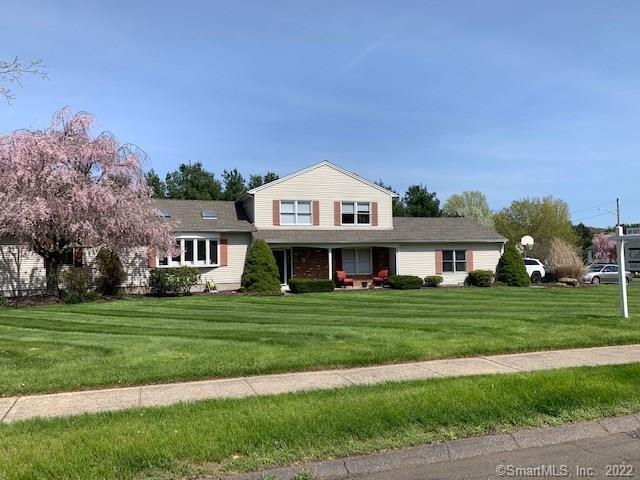 67 Rimmon Road North Haven, CT 06473 - Photo 1 of 1 a front view of a house with a garden