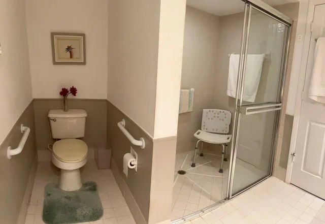 a bathroom with a toilet and a sink