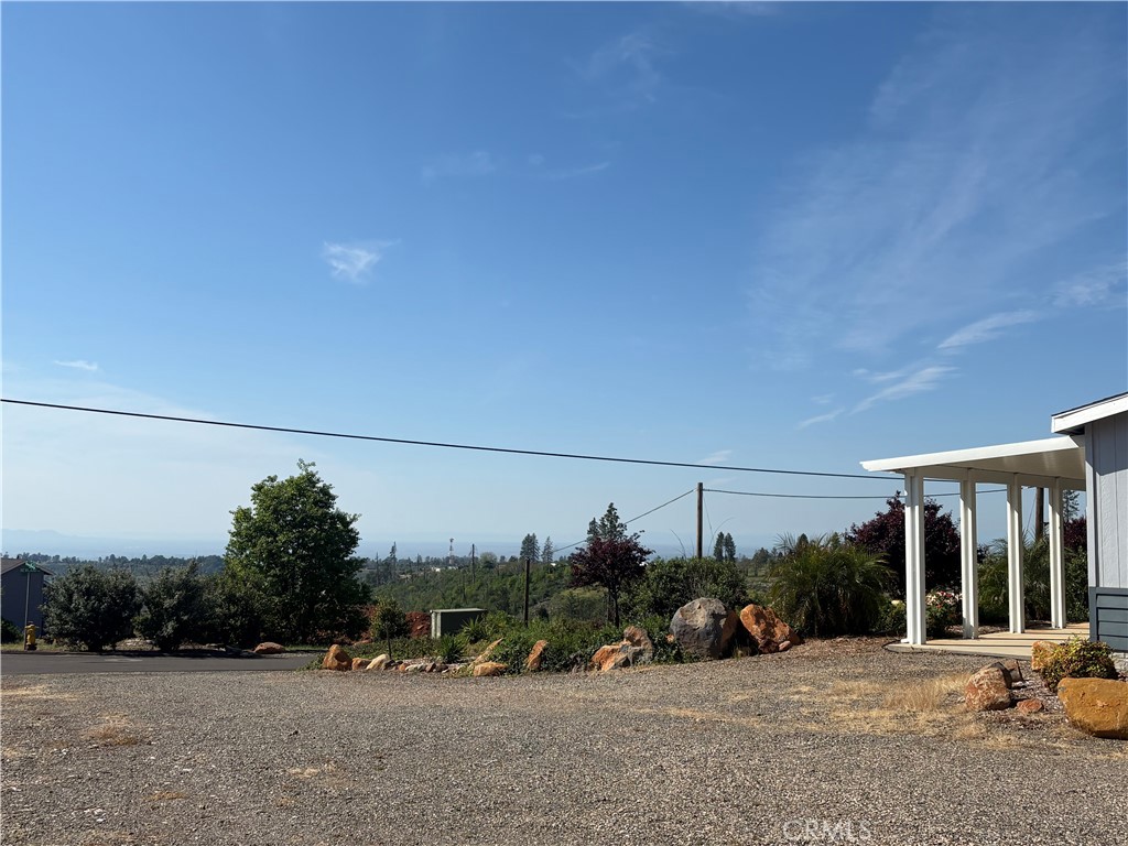 5548 Newland Road Paradise, CA 95969 - Photo 20 of 23 a view of a car park in front of a house