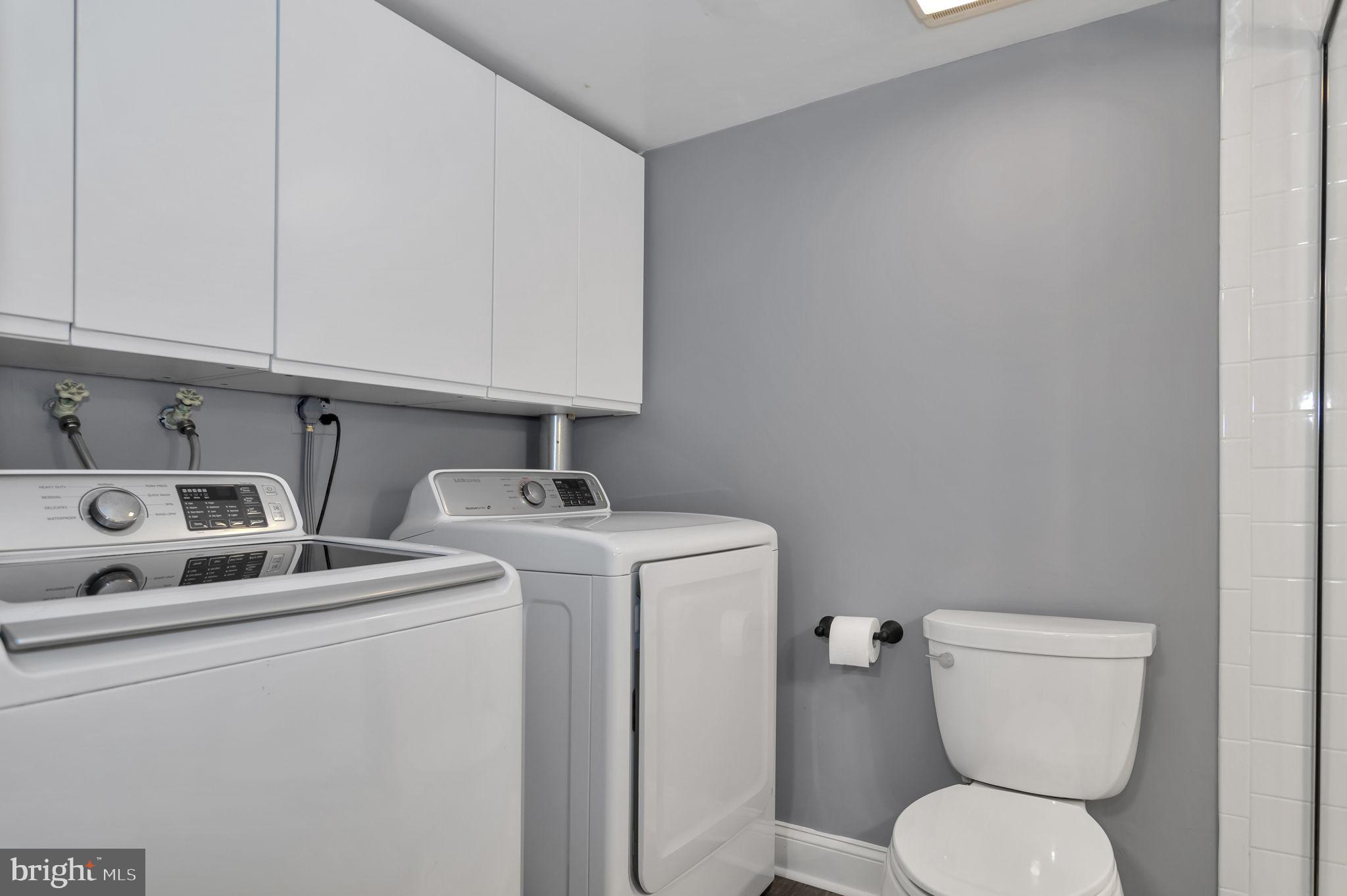 4237 32nd Road South Arlington, VA 22206 - Photo 25 of 49 a bathroom with a toilet sink and mirror