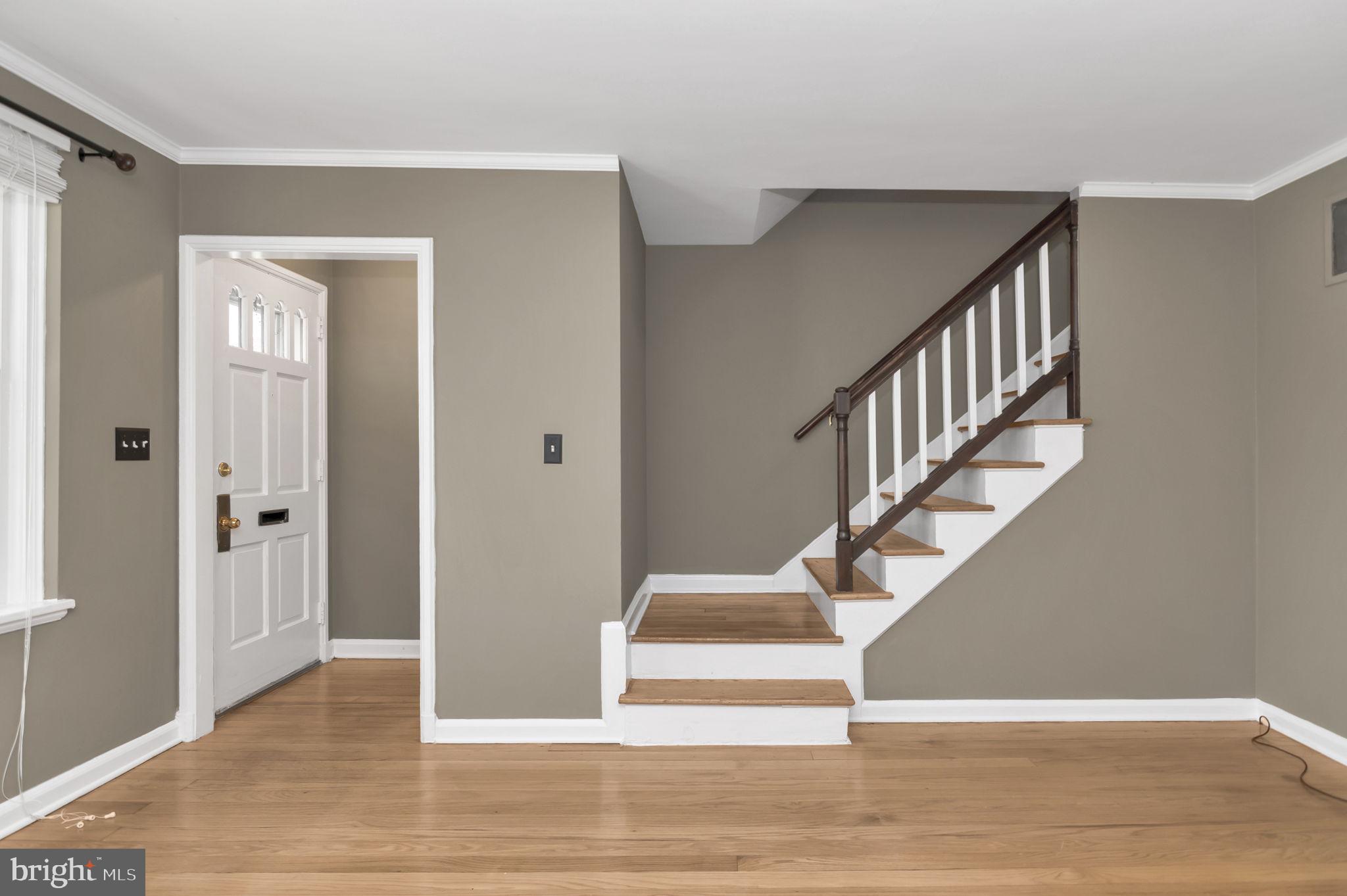 4237 32nd Road South Arlington, VA 22206 - Photo 6 of 49 a view of entryway and hall with wooden floor